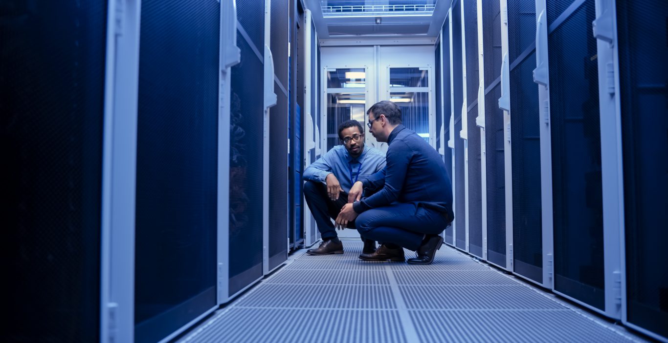 server corridor with two workers