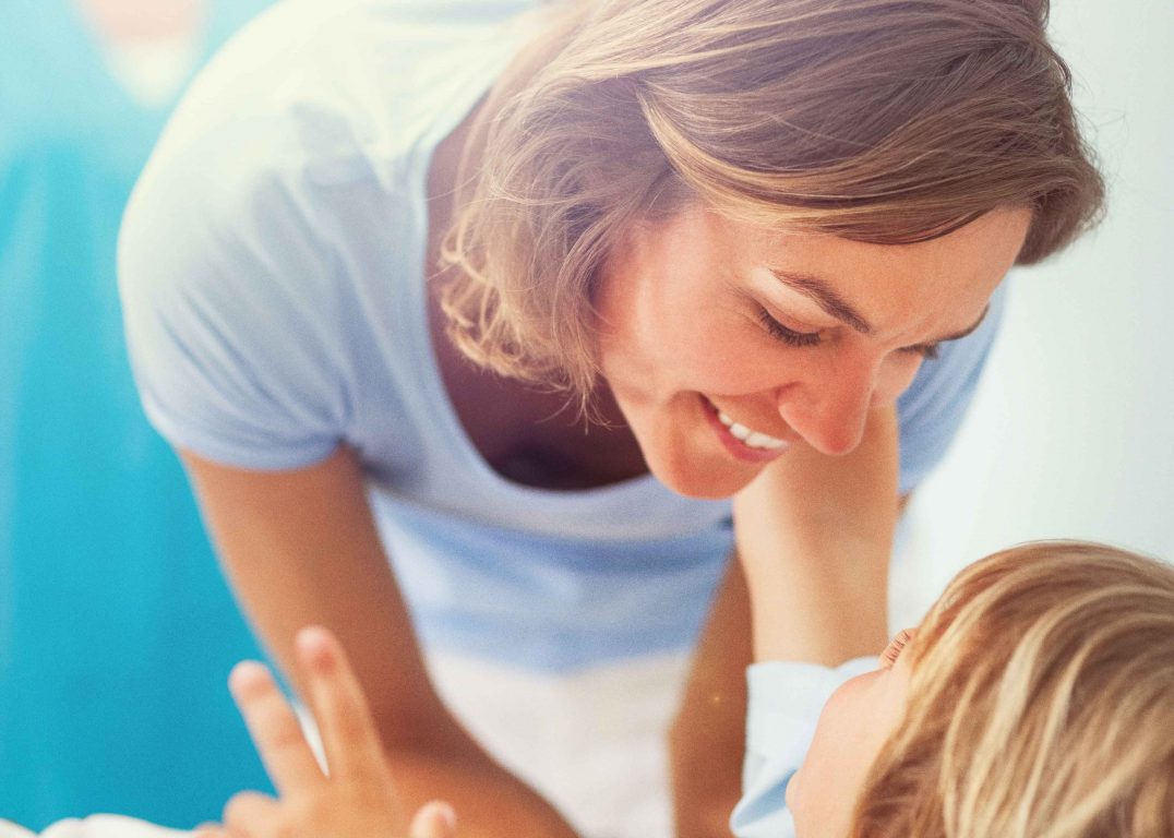 Mother and a child in a hospital patient room